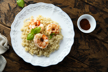 Wall Mural - Roasted shrimps with quinoa and basil