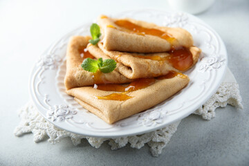 Wall Mural - Homemade crepes with apricot jam