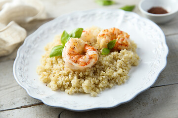 Wall Mural - Roasted shrimps with quinoa and basil