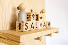 Wooden Blocks With Letters On Shelf