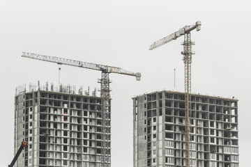 Tower crane, development of urban structures and construction of houses industry architecture