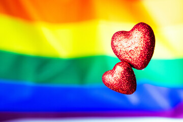 Hearts background homosexual lesbian concept. Two hearts lgbtq, gay, transgender love symbol. LGBT pride day celebration.