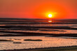 Sunset on the Wadden Sea at low tide