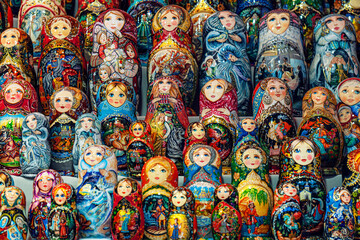 lots of nesting dolls. Traditional Russian souvenirs Matryoshka on shelfs in souvenir shop. lots of nesting dolls