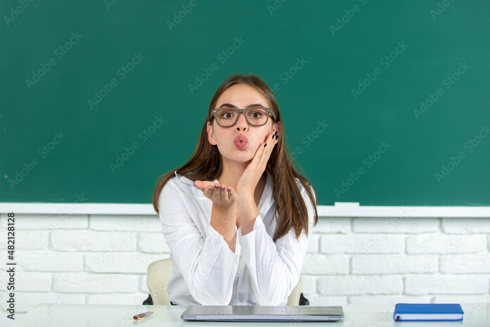 Funny Female Student With Air Kiss In School Classroom Cute School funny-female-student-with-air-kiss-in-school-classroom-cute-school
