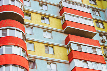 facade of an orange, yellow and white building