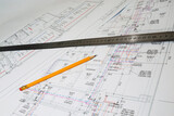 Fototapeta  - Engineering drawings in close-up. Engineering drawings with a ruler and pencils.