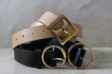 Three leather belts