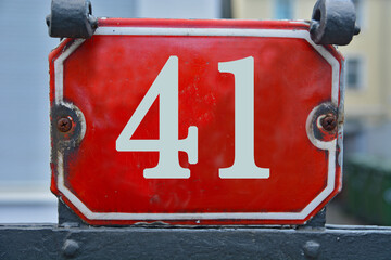 Wall Mural - A red number plaque, showing the number forty-one, 41