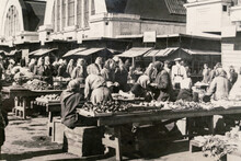 Latvia - CIRCA 1940s: Vintage Archive Photo Of Riga Central Market. People Trading All Kinds Of Vegetable On A Street Market