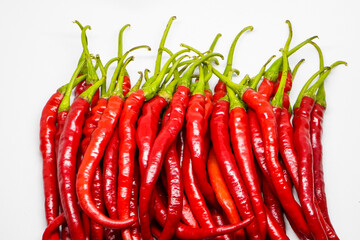 Wall Mural - Red Chili Curly is one of the most widely grown and sold red chili varieties in Indonesia. Many Indonesian dishes use this type of chili as an ingredient, including making chili sauce.