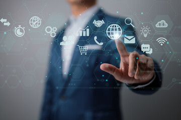 Poster - Businessman is using a digital vitual screen with charts on it. The concept of global business.