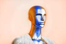 Colored Mannequin Close-up On A Light Background With Copy Space.