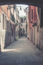 A Typical Venetian Charming Secluded Street Detail Seen From The Passage Arcade