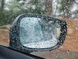 Fototapeta  - View from the car window on the highway during a winter downpour. Israel