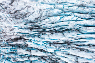 Wall Mural - Climate change matters. Iceland. Destruction of the glacier in Iceland due to global warming. Aerial view on the glacier. Famous place in Iceland.