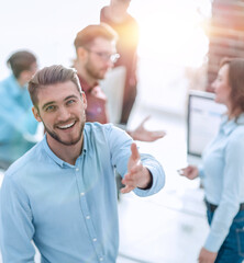 Poster - happy young business man portrait in bright modern office indoor