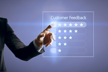 Poster - Close up of businessman hand pointing at customer feedback hologram on blue background. Rating and ranking concept.