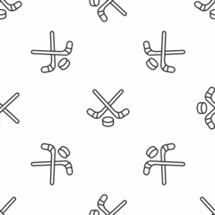 Poster - Grey line Ice hockey sticks and puck icon isolated seamless pattern on white background. Game start. Vector