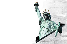 New York Symbol. Statue Of Liberty From USA. Monument Symbolizing Freedom And Democracy In USA. Statue Of Liberty In Mobile Phone. Copy Space On White. Place For Your Promotional Offer
