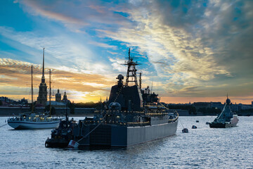 Wall Mural - Saint Petersburg Neva. Russian army. Navy in Saint Petersburg. Naval military parade in Neva. Modern warship in front of Peter and Paul Fortress. Saint Petersburg sunset. Russian Federation Navy