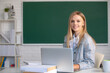 © Volodymyr - Focused student, young woman online watching webinar on laptop, listening learning education course, sit at work desk in classroom, elearning concept. Online webinar, video calling distance learning.