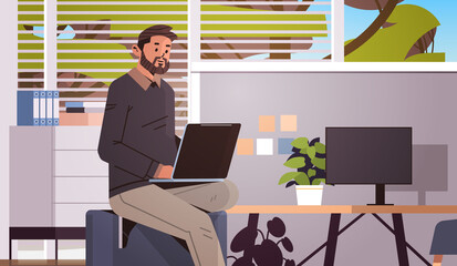 Poster - businessman working on laptop business man freelancer using notebook at workplace modern office inte
