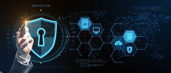 Poster - Close up of businessman hand pointing at abstract glowing keyhole shield interface on blurry background. Protection, safety and technology concept. Double exposure.