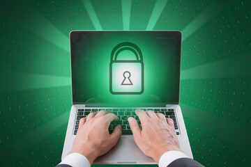 Leinwandbilder - Close up of businessman hands typing on laptop keyboard with glowing padlock on coding background. Digital safety, security, antivirus and protection concept.