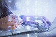 © peshkova - Multi exposure of woman hands working on computer and data theme hologram drawing. Tech concept.