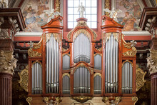 The Organ In The Baroque Parish Church In Poznan, Poland. Fragment Of The Instrument.
