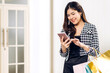 © Art_Photo - Portrait of smiling beauty asian fashion happy woman relax and enjoy shopping time summer sale walk and holding shopping colorful bag to buy something purchases use smartphone at store