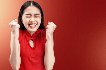 Poster - Asian Chinese woman in a cheongsam dress with happy expression celebrates Chinese New Year