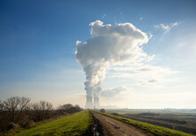 Steam Rising From Cooling Towers Of Nuclear Power Plant