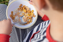 Close-up Of Boy (18-23 Months) Eating Cereal