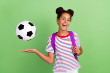 Photo Of Young Black Girl Happy Positive Smile Play Football Game Sport School Isolated Over Green Color Background