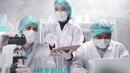 Wall Mural - scientist team has researching in the laboratory, meeting and writing analysis results of coronaviru