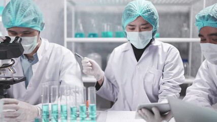 Wall Mural - scientist team has researching in the laboratory, meeting and writing analysis results of coronaviru