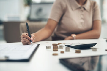 Poster - Working on her company's balance sheet. Closeup shot of an unrecognisable businesswoman calculating finances in an office.