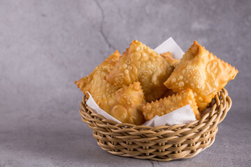 Traditional pastry called pastel  in Brazil. Brazilian snack. Brazilian pastry