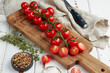© echo617 - Fresh red cherry tomatoes on white wooden background