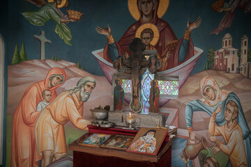 Christening bath and the altar at the orthodox church during christening