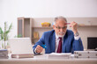© Elnur - Old male employee in remuneration concept at home