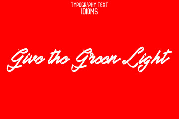Wall Mural - Give the Green Light Elegant Phrase Cursive Typographic Text idiom on Red Background