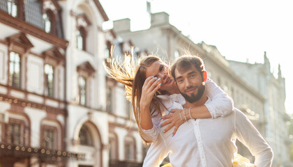 Young couple in love having fun in the city. Love and romance concept