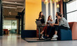 Leinwandbild Motiv Diverse businesspeople working in an office lobby