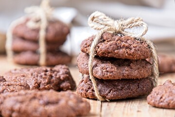 Close up of choc chip cookies tied with string