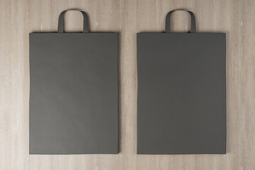 Poster - Close up of clean paper bag on wooden background. Mock up place for your advertisement or logo. 3D Rendering.