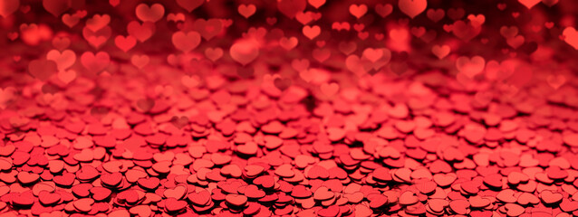 background of red shiny hearts for Valentine's day celebrations, festive wedding layouts and concepts on the theme of love