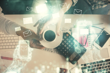 Aufkleber - Double exposure of man and woman working together and the envelop hologram drawing. Computer background. Top View. Electronic mail concept.